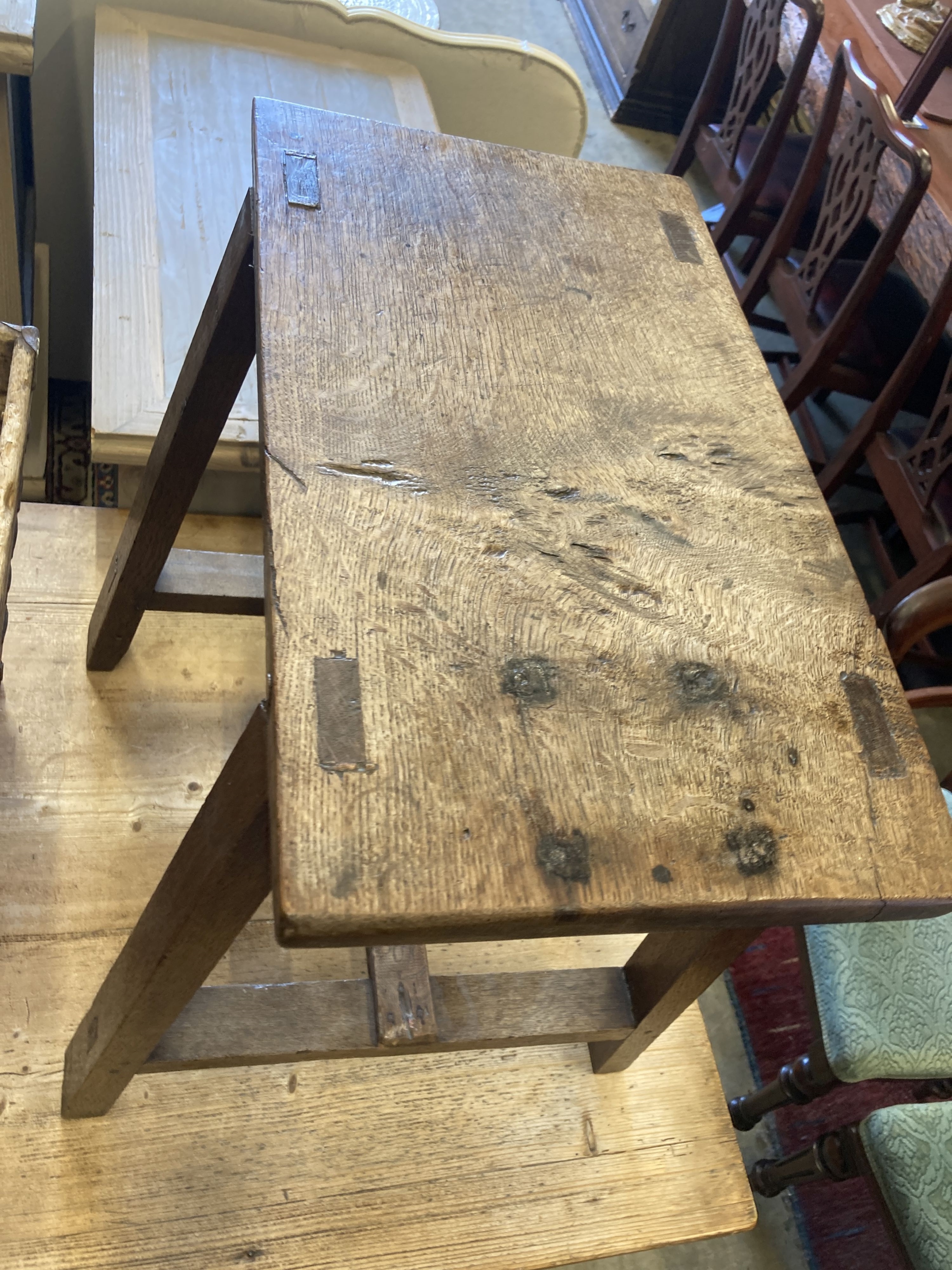 A rectangular provincial oak low table, width 55cm, depth 32cm, height 55cm together with a square Chinese bucket